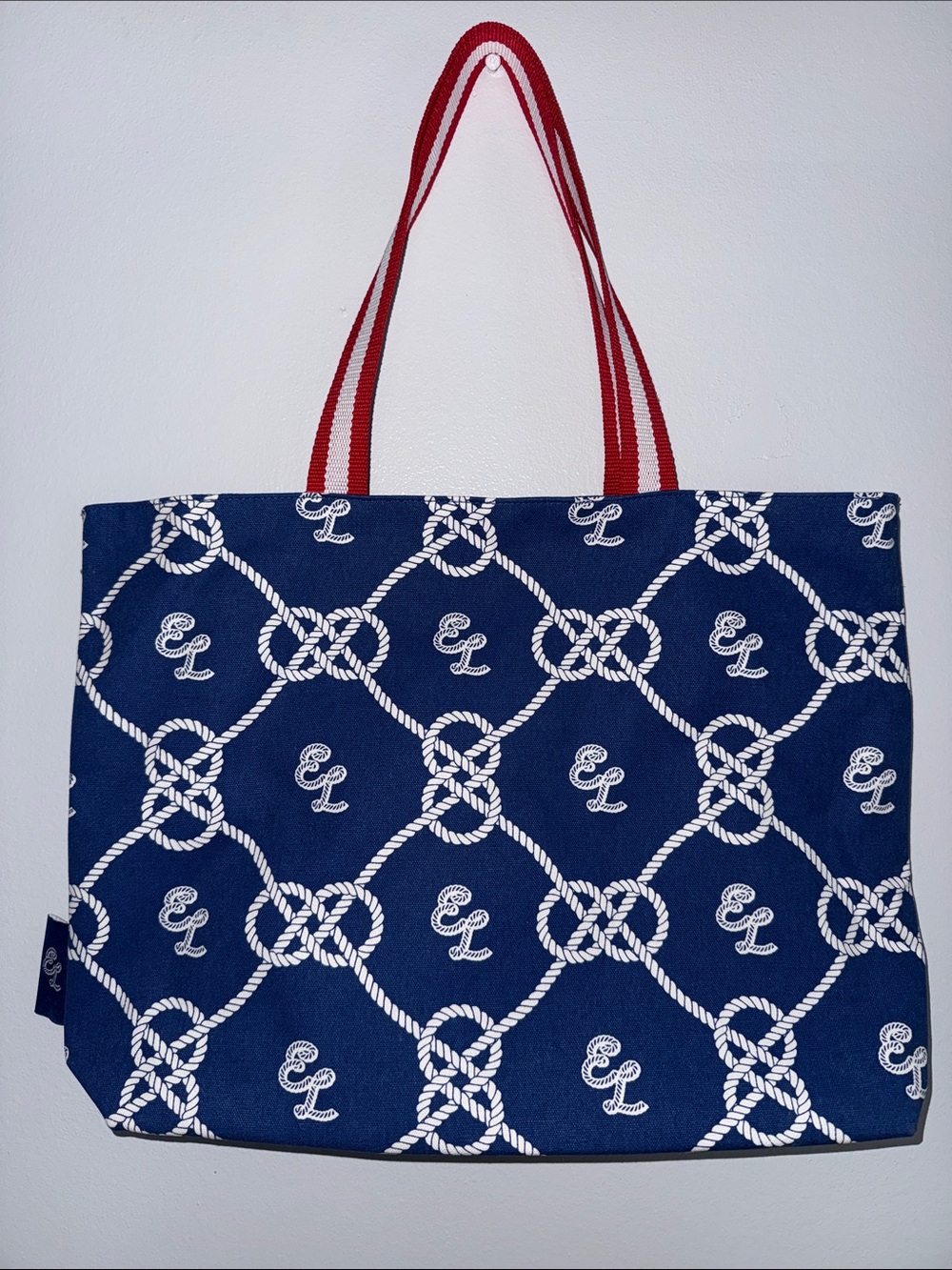 Estee Lauder Navy Tote with White Rope Pattern and Red Striped Handles